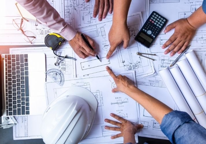 engineers working together to solve a problem